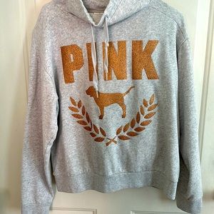 Pink women’s sweater and juggle